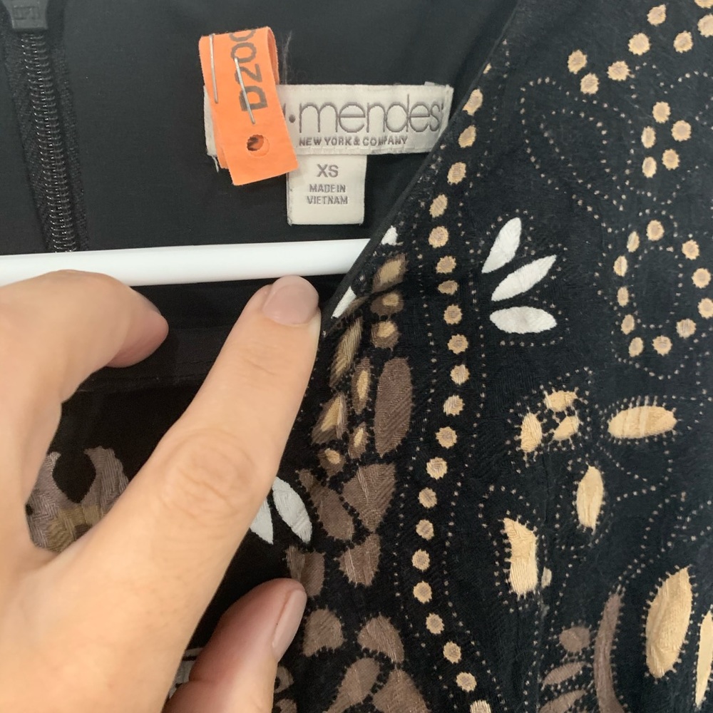 Eva Mendez Peplum Sleeveless Top